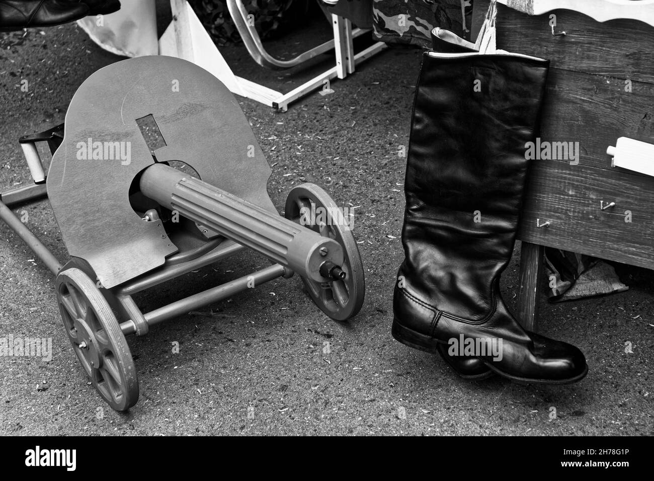 Officer's boots and fake machine gun MAXIM Stock Photo