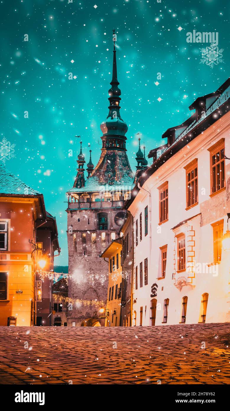 winter night in medieval town of Sighisoara Stock Photo