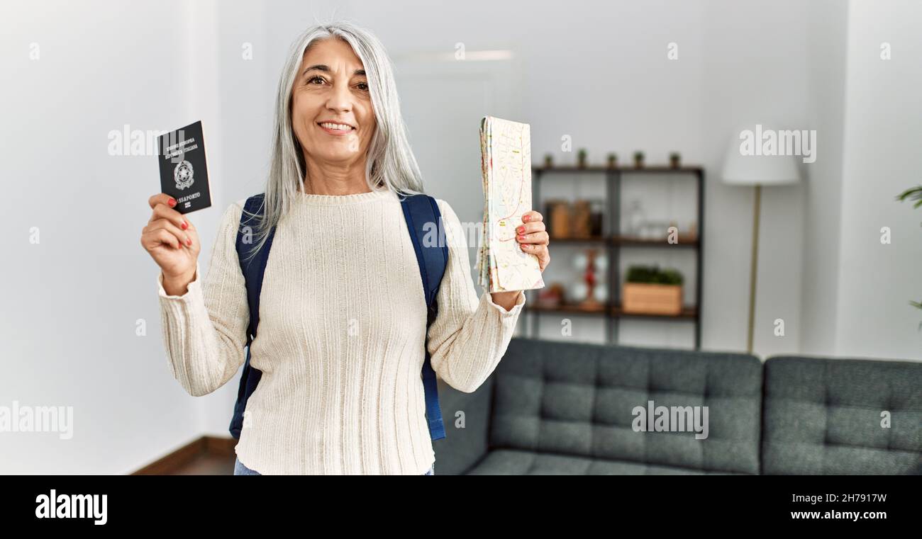 Mature woman passport map hi-res stock photography and images - Alamy