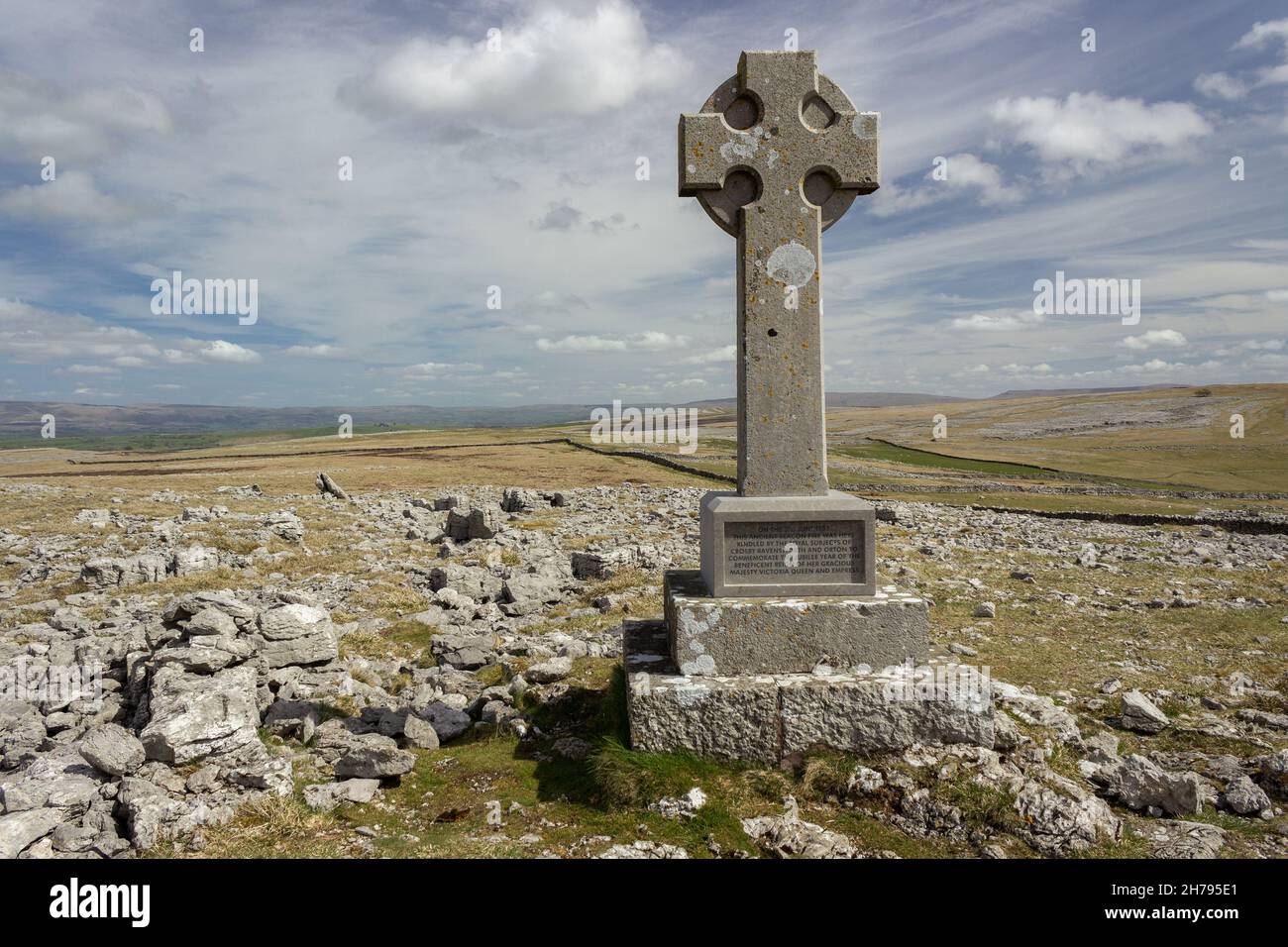 Cumbria, UK: Queen Victoria jubilee monument on Beacon Hill, Orton Scar. The limestone pavement of Great Asby Scar can be seen in the background. Stock Photo