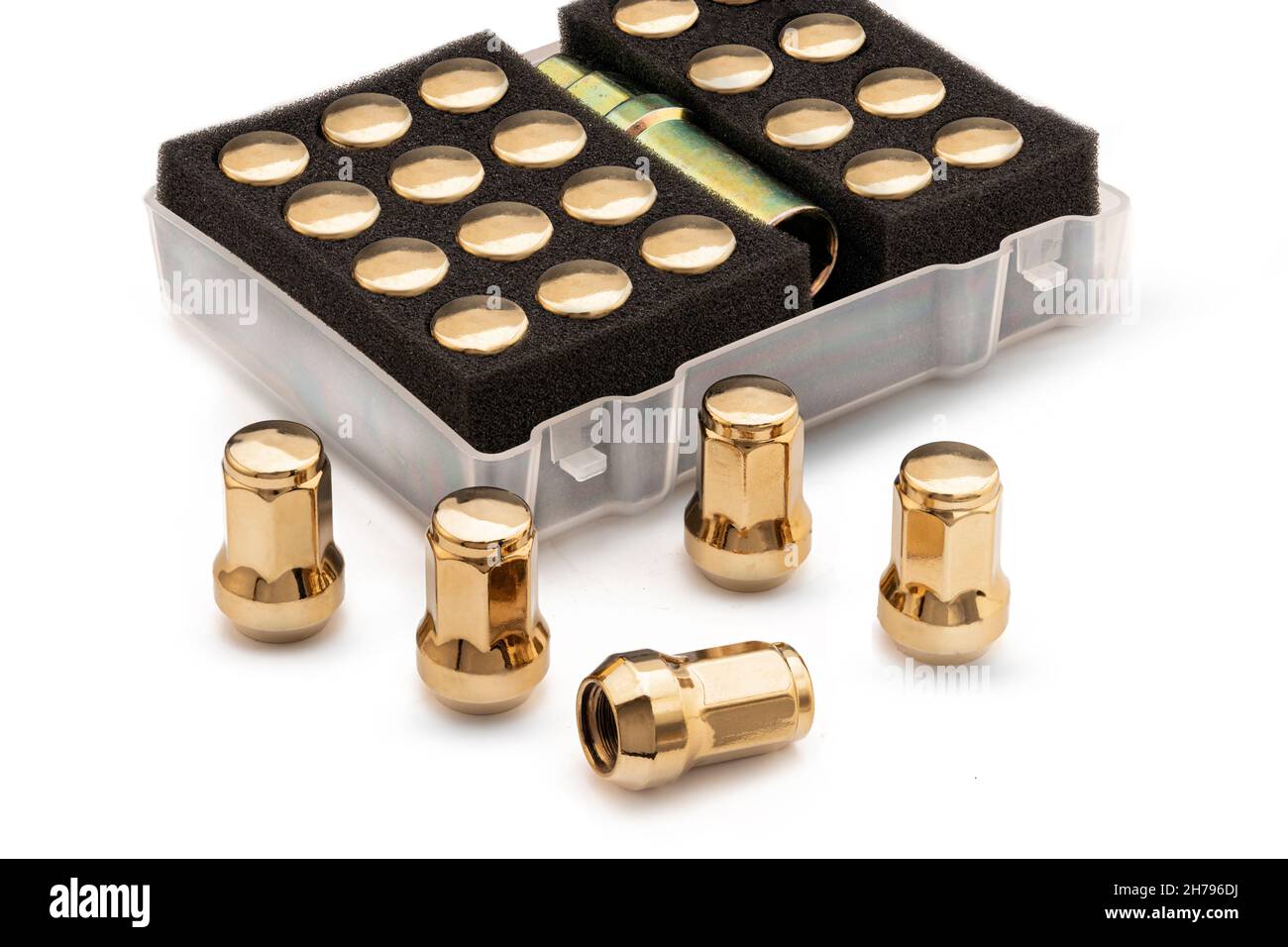 a set of colored gold yellow wheel nuts for wheels. auto tuning and car maintenance, beautiful