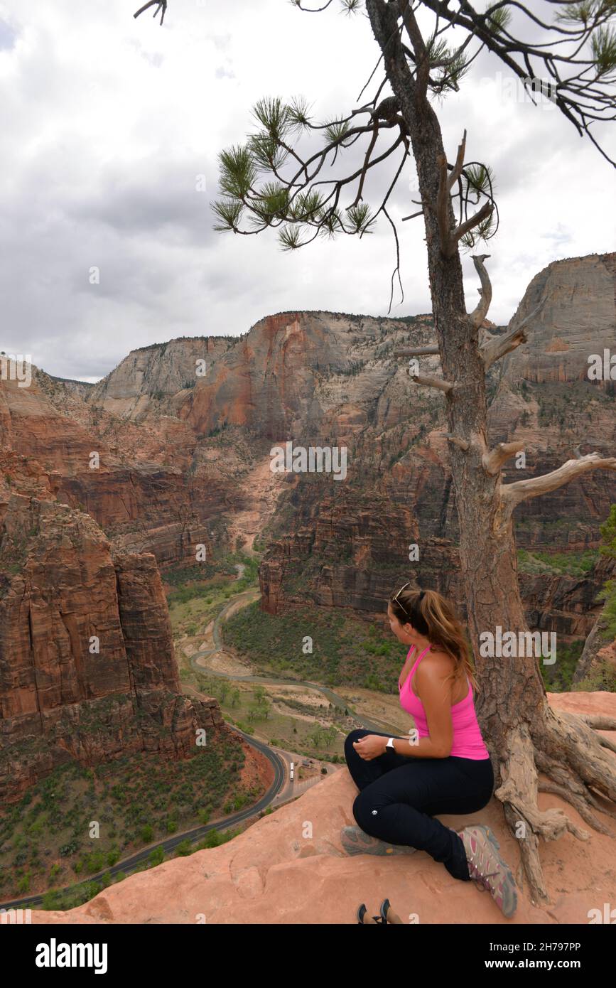Female hiker sitting edge canyon hi-res stock photography and images ...