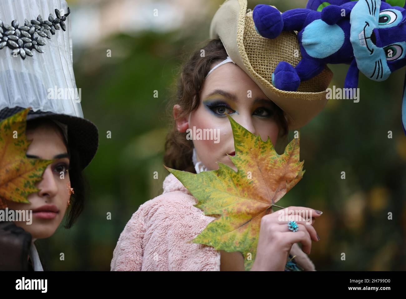 Models showcase Pierre Garroudi's collection during the designer's flash mob fashion show in London, UK Stock Photo