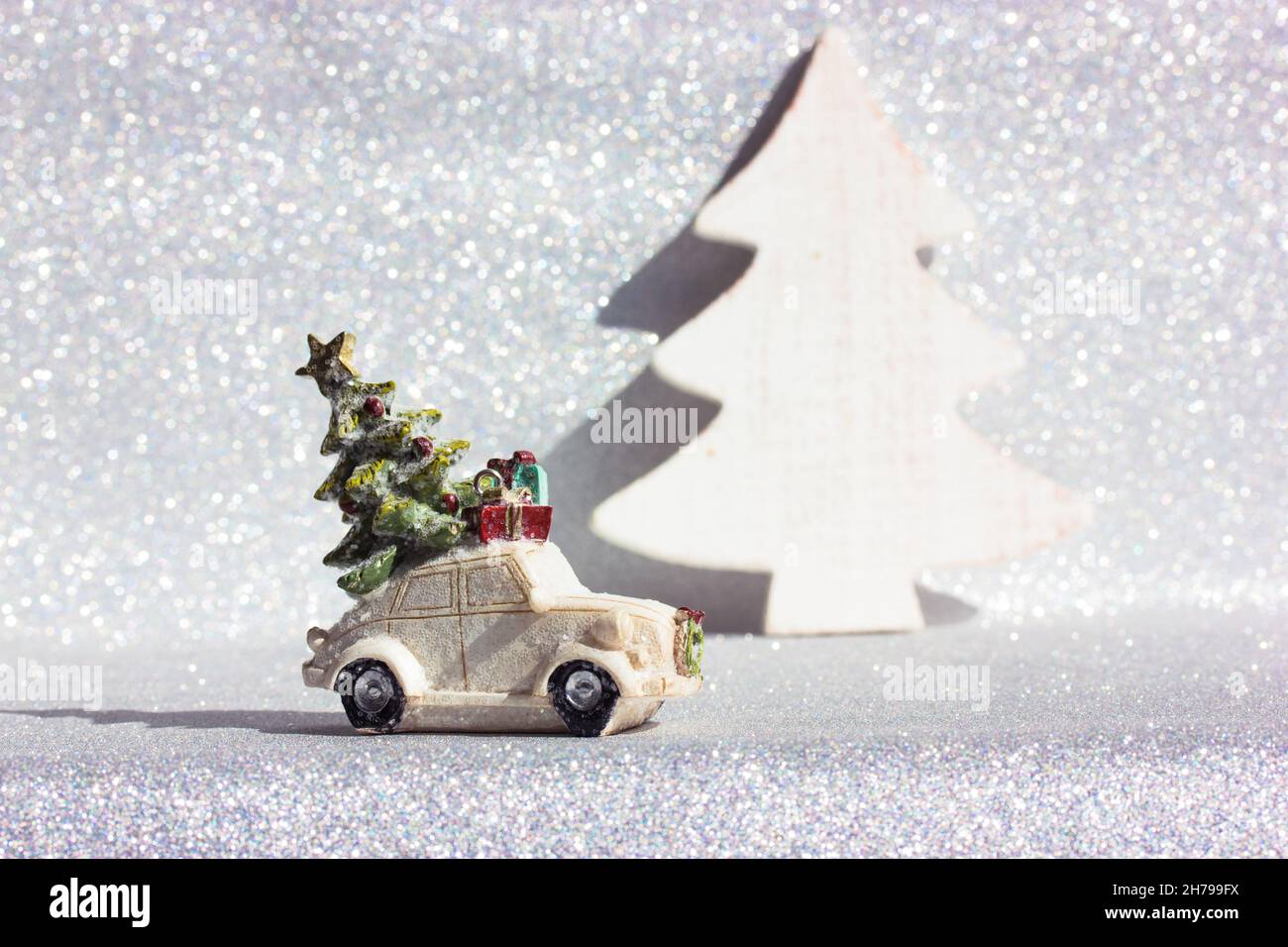 Got Car For Christmas 2022 Toy Car With Christmas Tree On Roof On Silvered Background. New Year 2022  Winter Stock Photo - Alamy