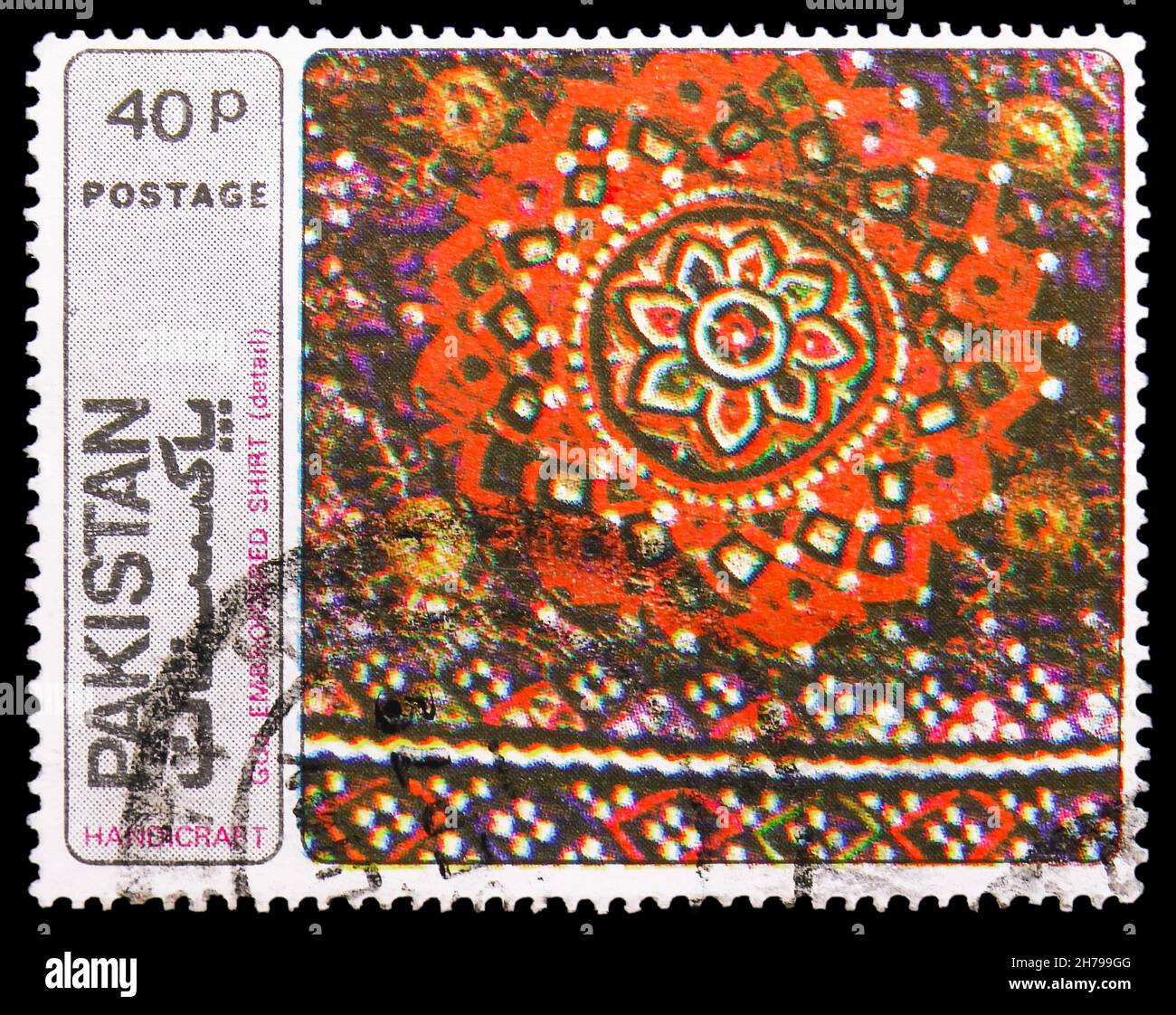 MOSCOW, RUSSIA - OCTOBER 25, 2021: Postage stamp printed in Pakistan shows Gujrat Embroideried Shirt, Pakistan Handi Crafts Series, circa 1979 Stock Photo