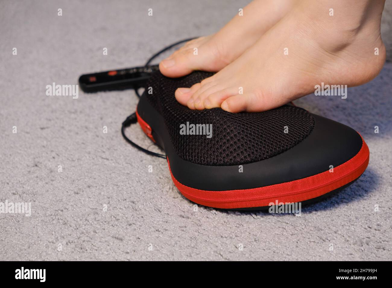 Women's legs and electric automatic massager, foot massage with a