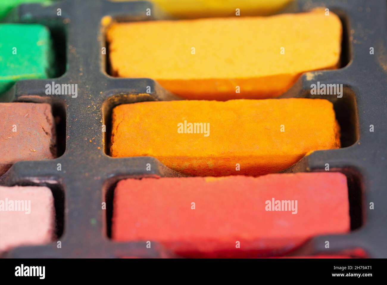Soft pastel chalk in warm colors. Stock Photo