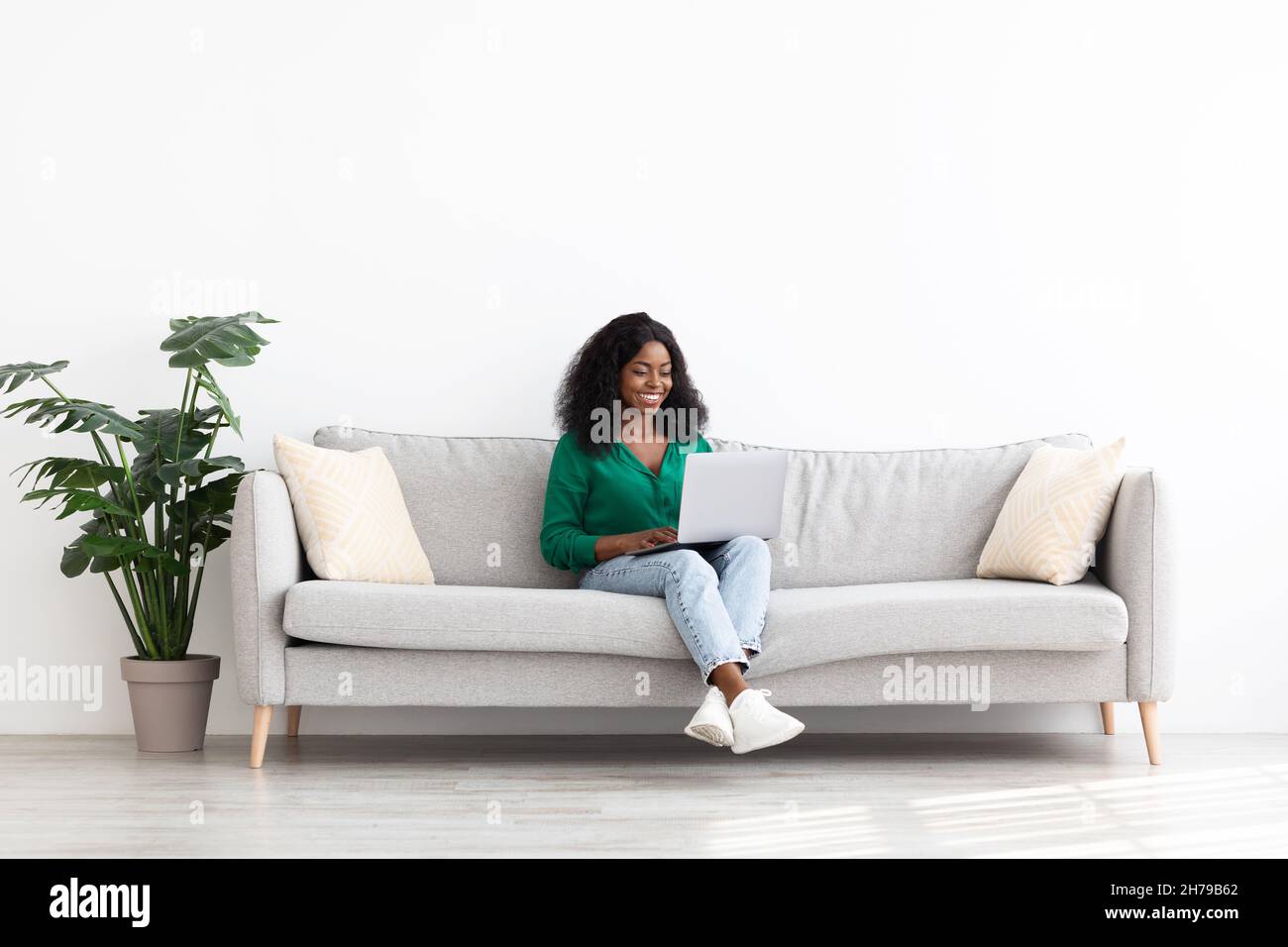 Stylish african american lady independent contractor working from home Stock Photo