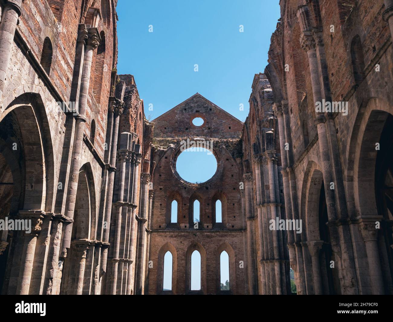 Chiusdino, Italy - August 14 2021: Abbazia San Galgano Abbey, the Ruin of a Gothic Monastery Interior Stock Photo