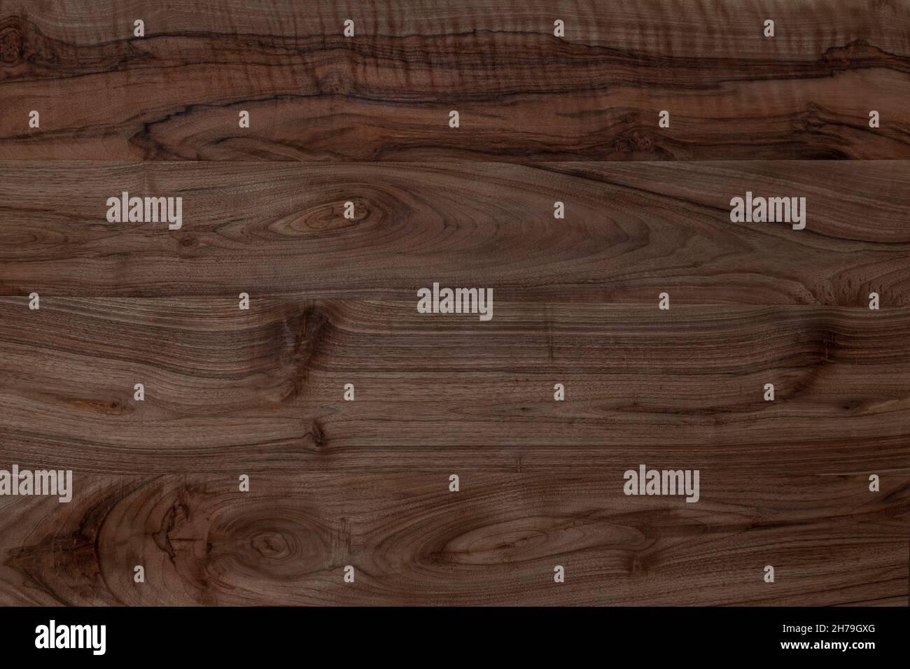 Wood walnut texture. Long wood planks of walnut. Natural texture with