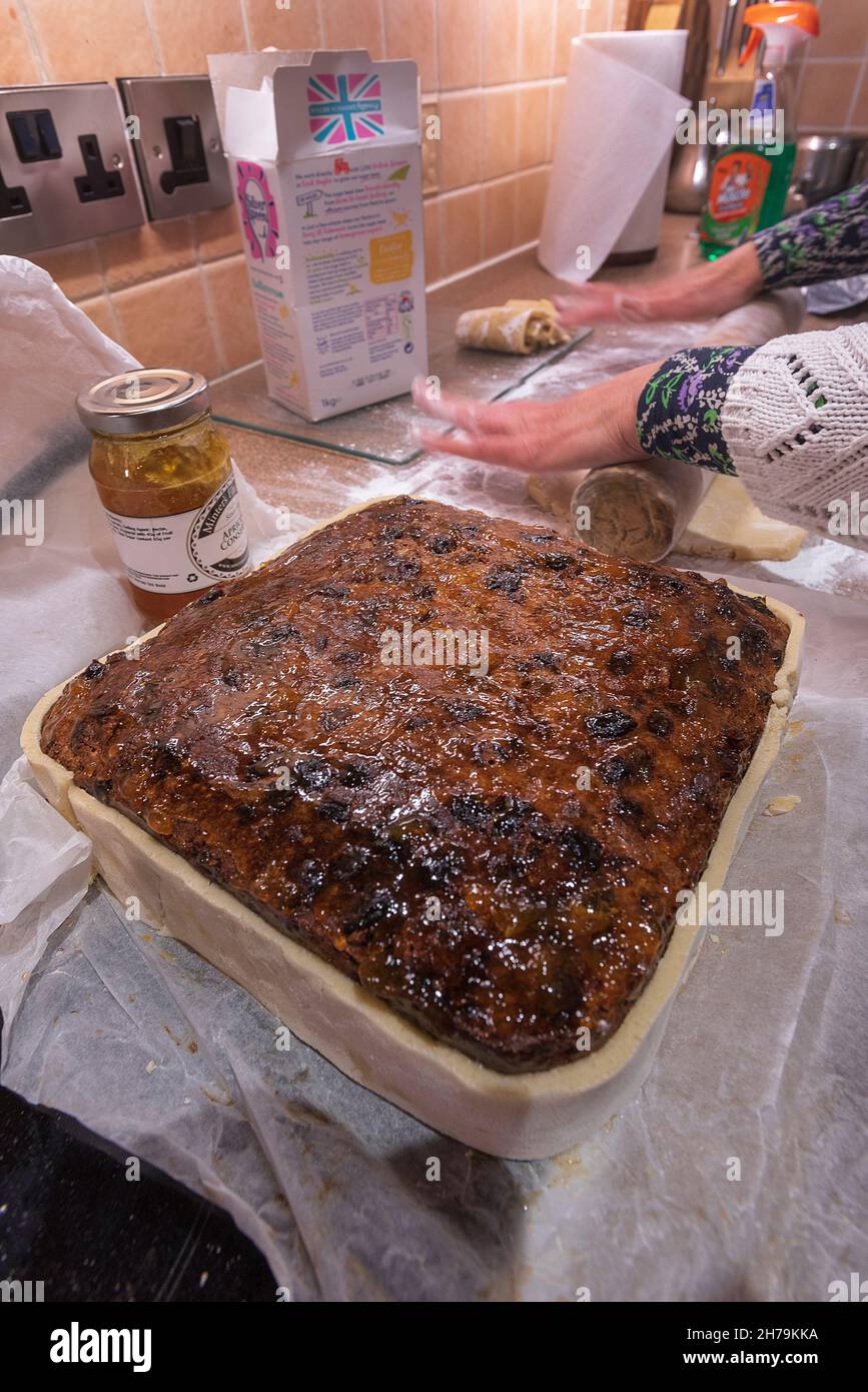 Baking a fruit cake for christmas. Stock Photo