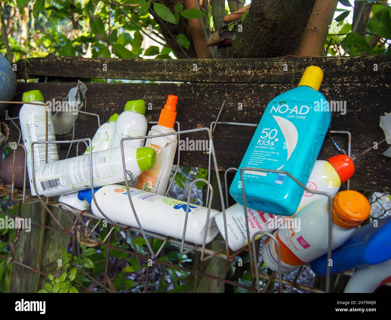 Various containers of sunscreen offered to people visiting the Octagon Wildlife Sanctuary in Punda Gorda, Florida, USA, 2020 © Katharine Andriotis Stock Photo