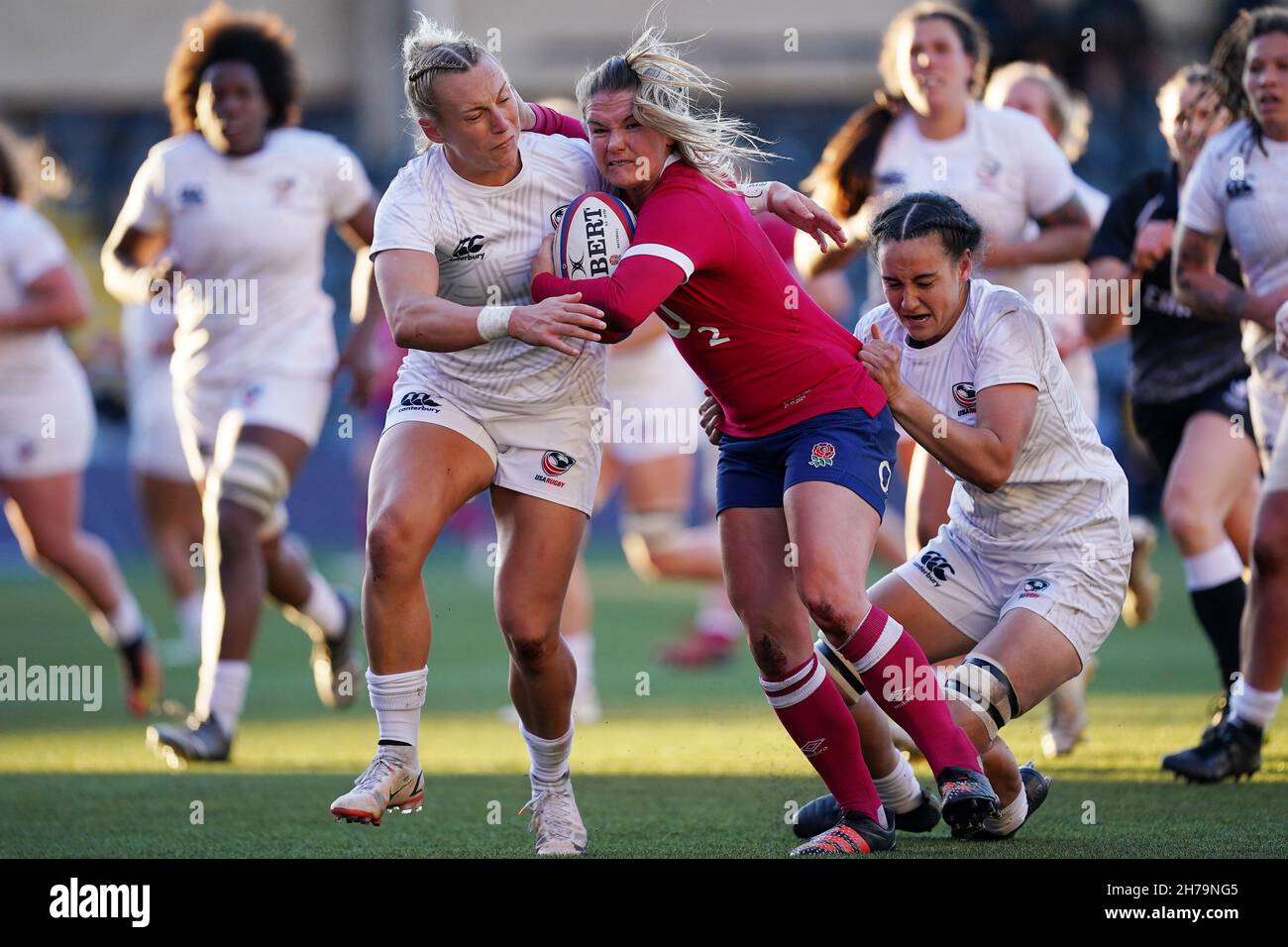 England's Leanne Infante is tackled by Hallie Taufoou and McKenzie Hawkins of the USA during the Autumn International match at Sixways Stadium, Worcester. Picture date: Sunday November 21, 2021. Stock Photo