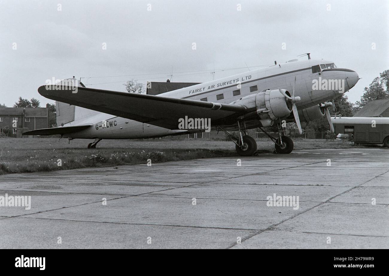 A vintage black and white photograph showing a Douglas DC-3, C-47, Dakota, serial number G-ALWC, belonging to Fairey Air Surveys Ltd. Photo taken at White Waltham airport on 19th April 1970. Stock Photo