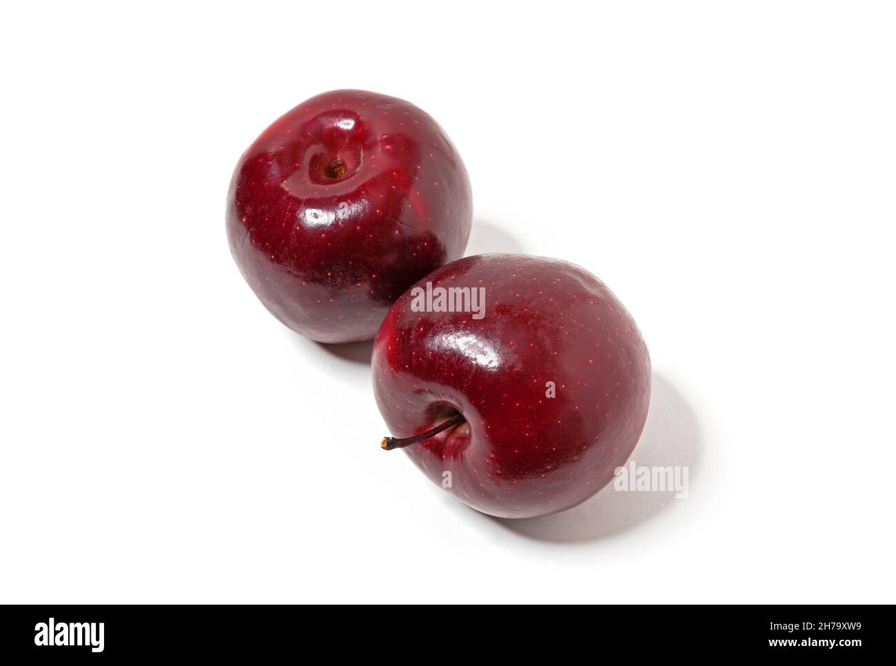 Two red apples isolated on white. Fresh apples. Stock Photo
