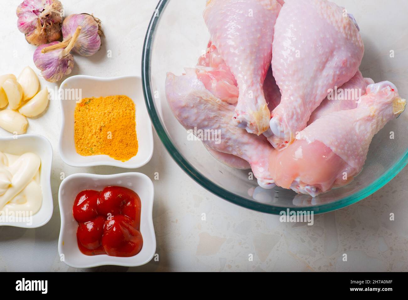 many different ingredients for marinating chicken drumsticks Stock