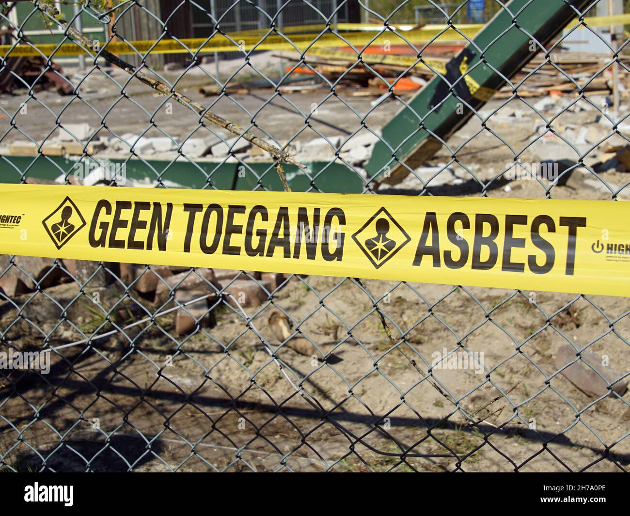 Katwijk, the Netherlands - April 27, 2021:  Dutch attention sign warning for prohibited access due to asbestos Stock Photo