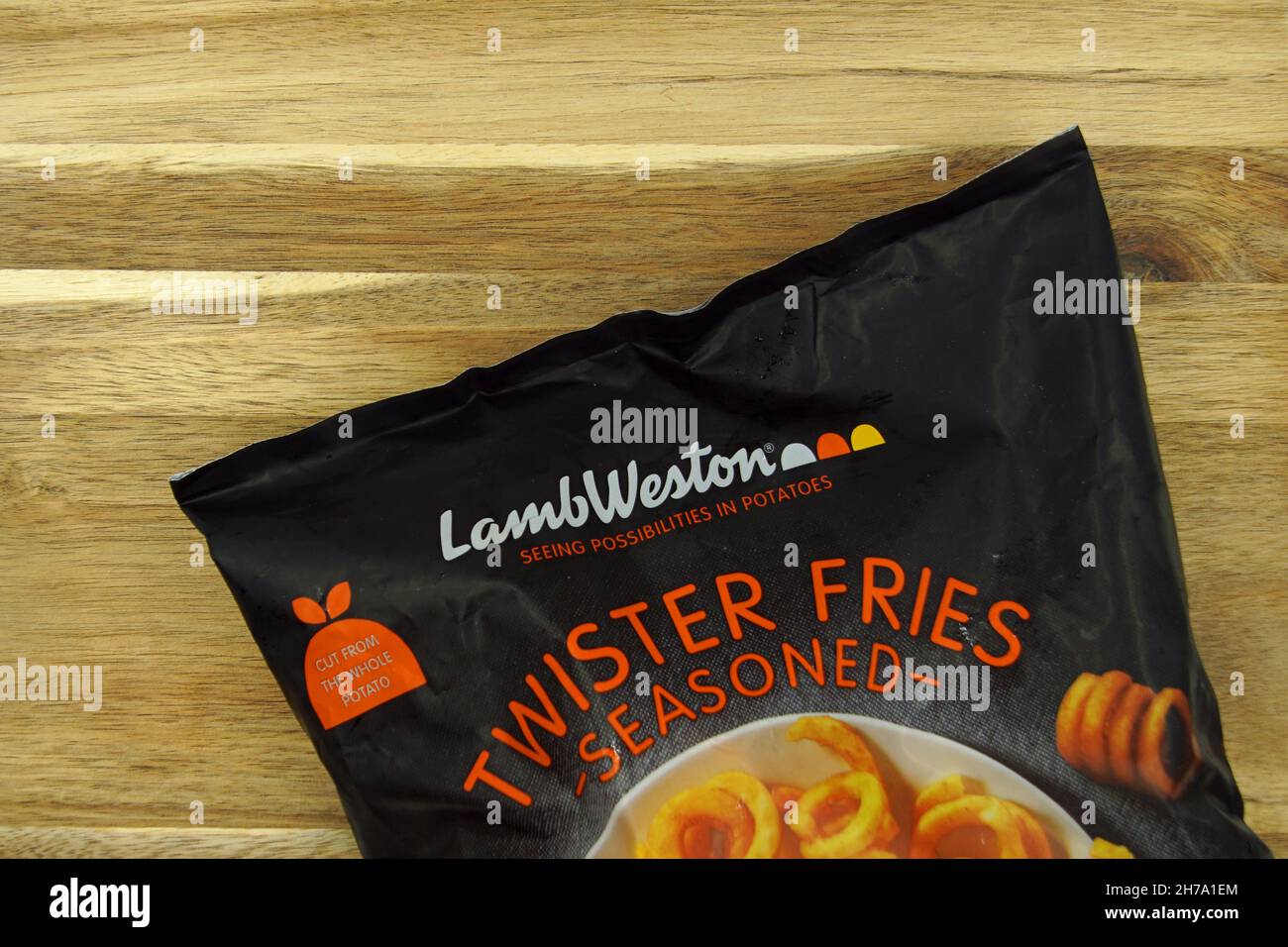 Zaandam, the Netherlands - November 21, 2020: Package of Lamb Weston Twister Fries on a kitchen table. Stock Photo