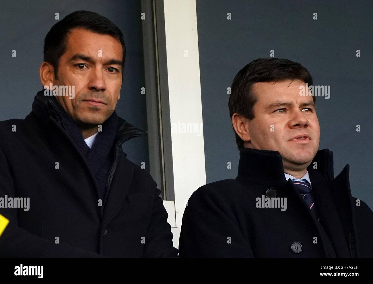 New Rangers manager Giovanni van Bronckhorst (left) and Rangers sporting director Ross Wilson in the stands during the Premier Sports Cup semi-final match at Ibrox Stadium, Glasgow. Picture date: Sunday November 21, 2021. Stock Photo
