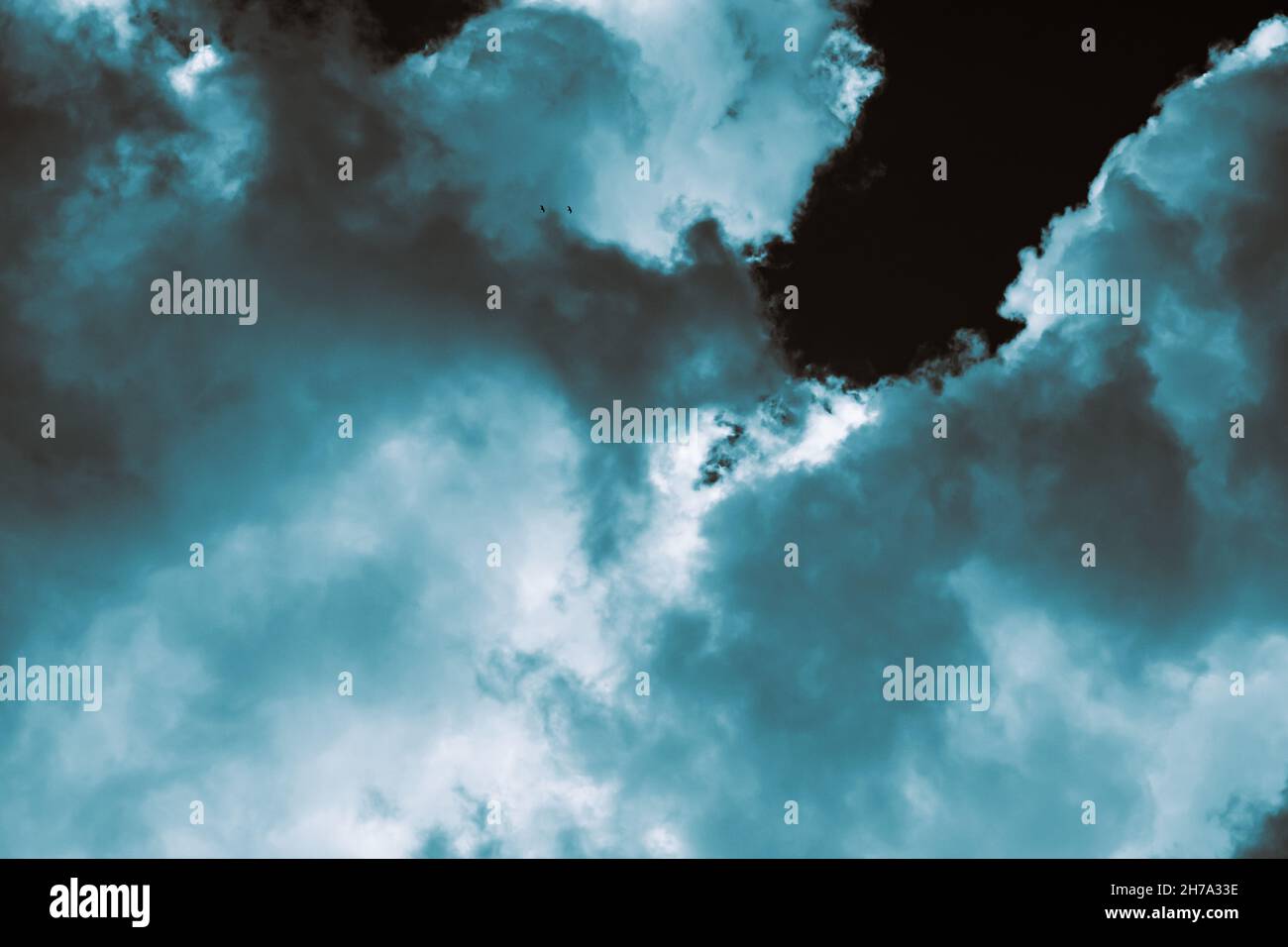 Dramatic sky. Dramatic clouds in monochrome full frame background photo.  Stock Photo