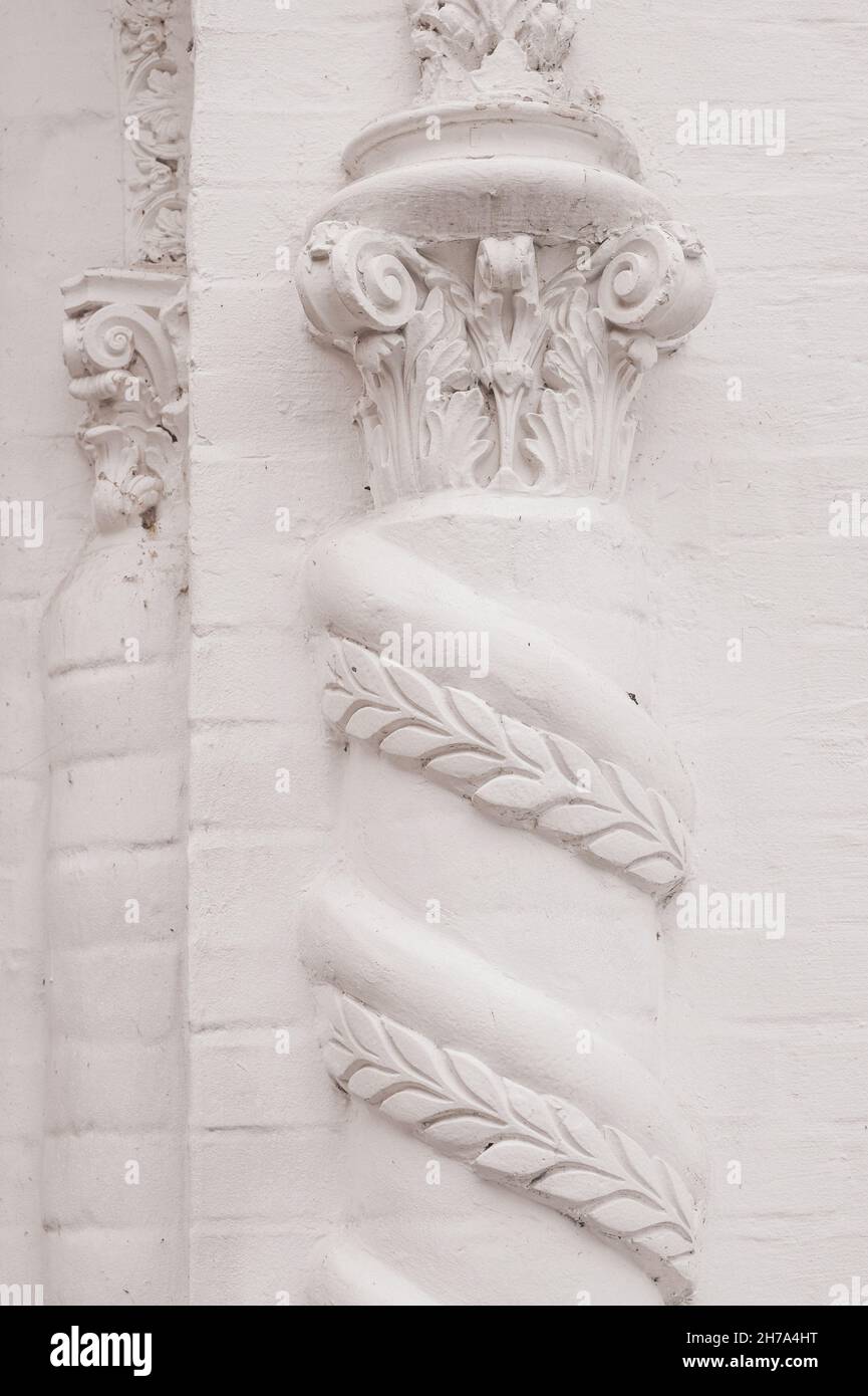 Elements of architectural decorations of buildings, gypsum stucco, wall texture, plaster ornaments and patterns Stock Photo