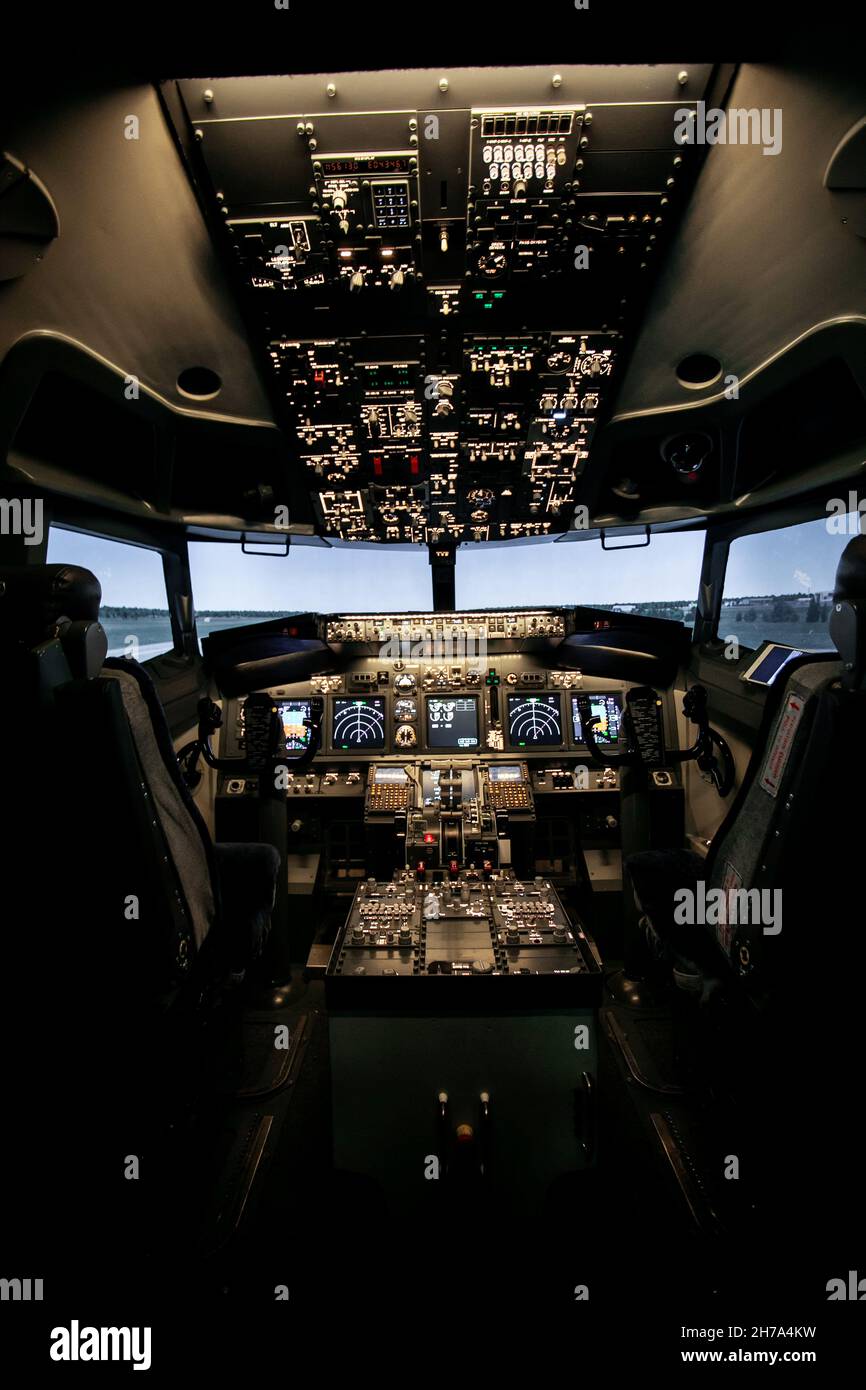 Aircraft interior, cockpit view inside the airliner. Point of view from