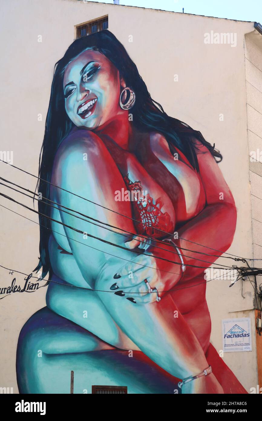 Buxom women street art in Cacabelos Stock Photo
