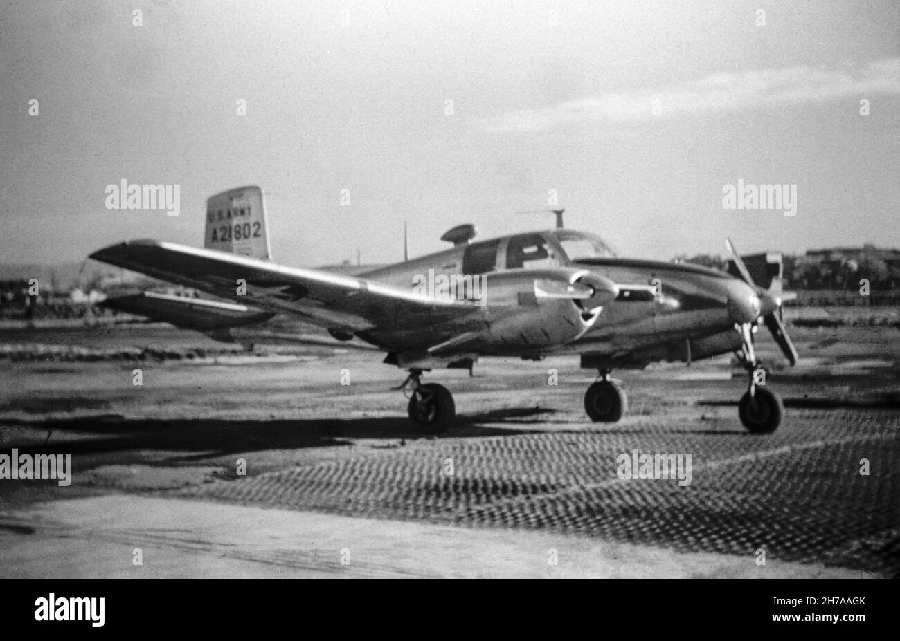 A photograph of a Beech YL-23 Seminole, serial number 52-1802, of the United States Army, taken at Airstrip A-2 near Seoul during the Korean War, in 1953 or 1954. Stock Photo