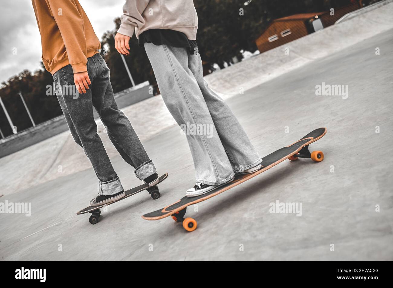 Crisp Two Adjacent Students Stand On Stationary Skateboards Design for Your Screen Crisp Two Adjacent Students Stand On Stationary Skateboards Design for Your Screen