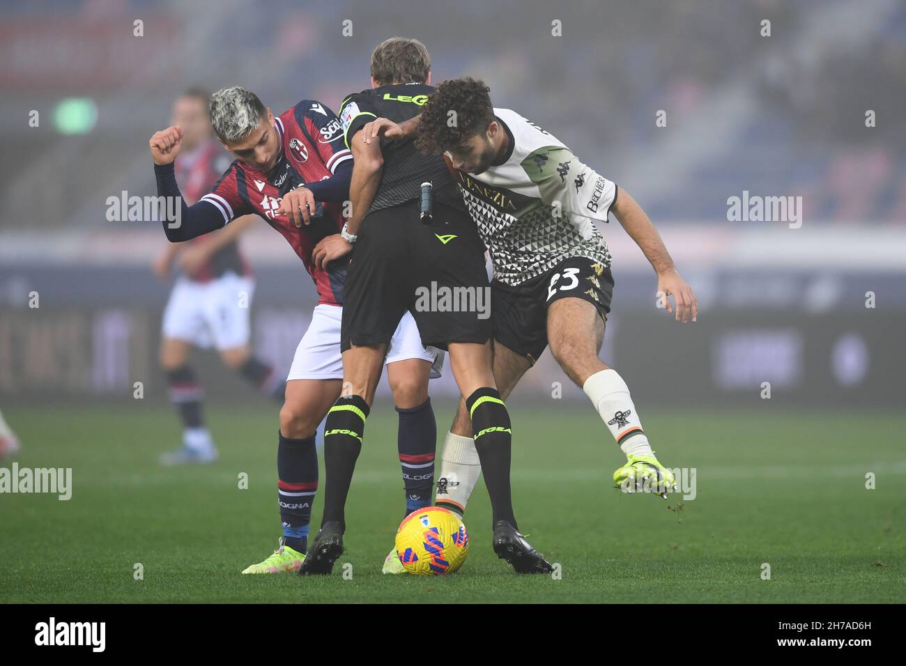 Nicolas Dominguez (Bologna)Daniele Chiffi (Referee)Sofian Kiyine (Venezia) during the Italian 'Serie A' match between Bologna 0-1 Venezia at Renato Dall Ara Stadium on November 21, 2021 in Bologna, Italy. Credit: Maurizio Borsari/AFLO/Alamy Live News Stock Photo