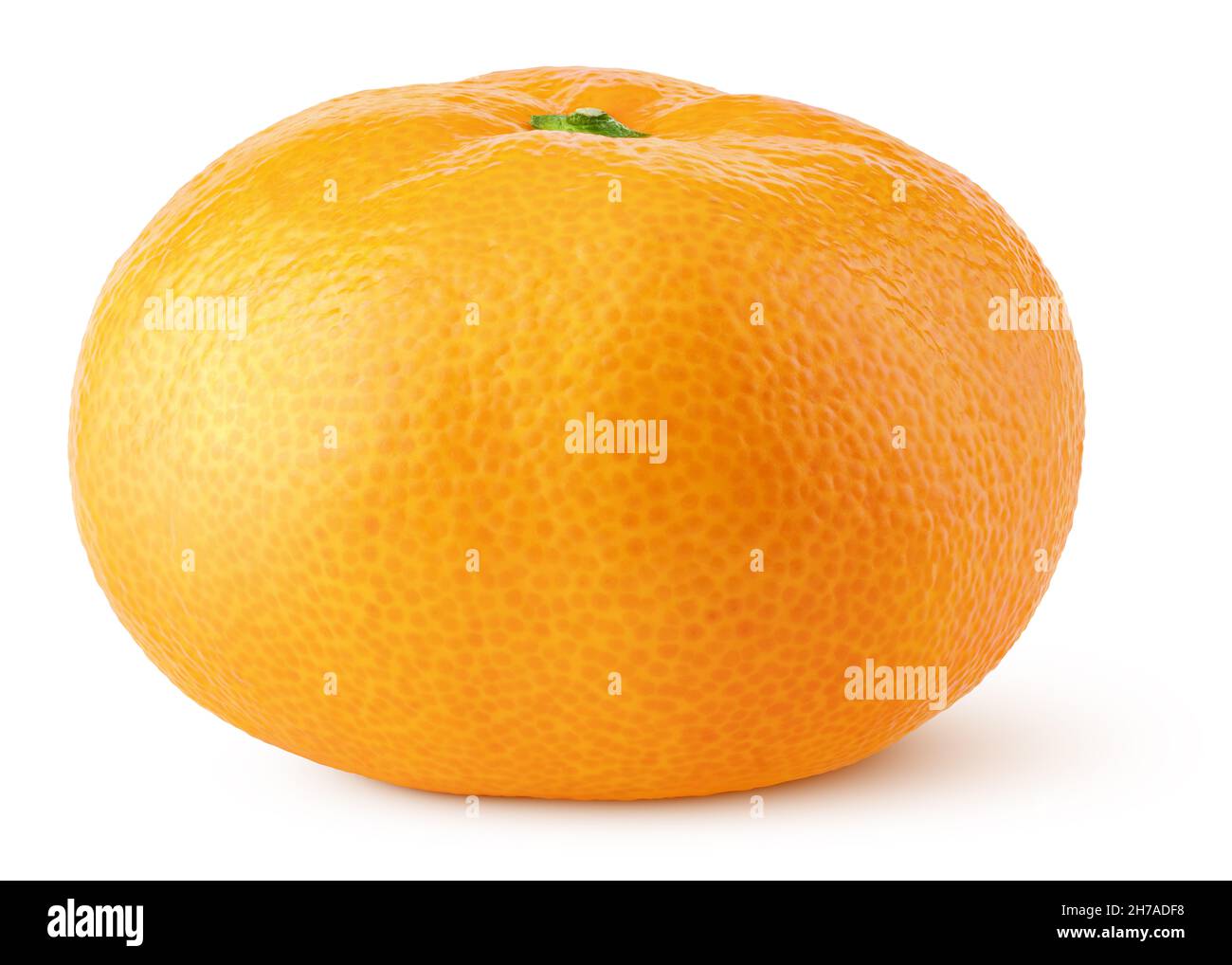 Whole flat tangerine or orange citrus fruit isolated on white background. Full tangerine with clipping path. Full depth of field. Stock Photo