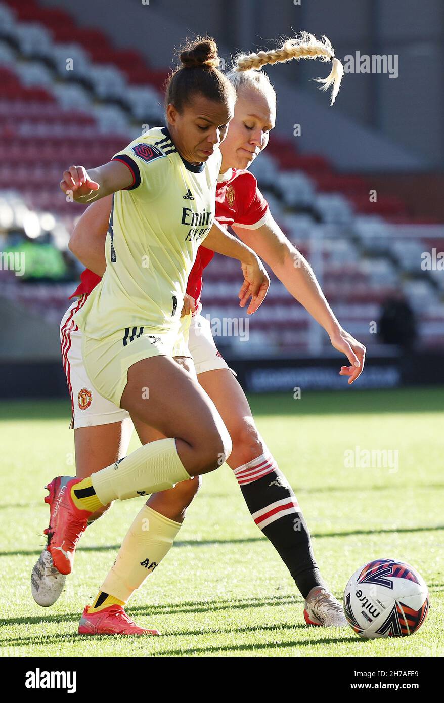 Leigh, UK. 21st Nov, 2021. Maria Thorisdottir of Manchester Utd challenges Nikita Parris of Arsenal during the The FA Women's Super League match at Leigh Sports Village, Leigh. Picture credit should read: Darren Staples/Sportimage Credit: Sportimage/Alamy Live News Stock Photo