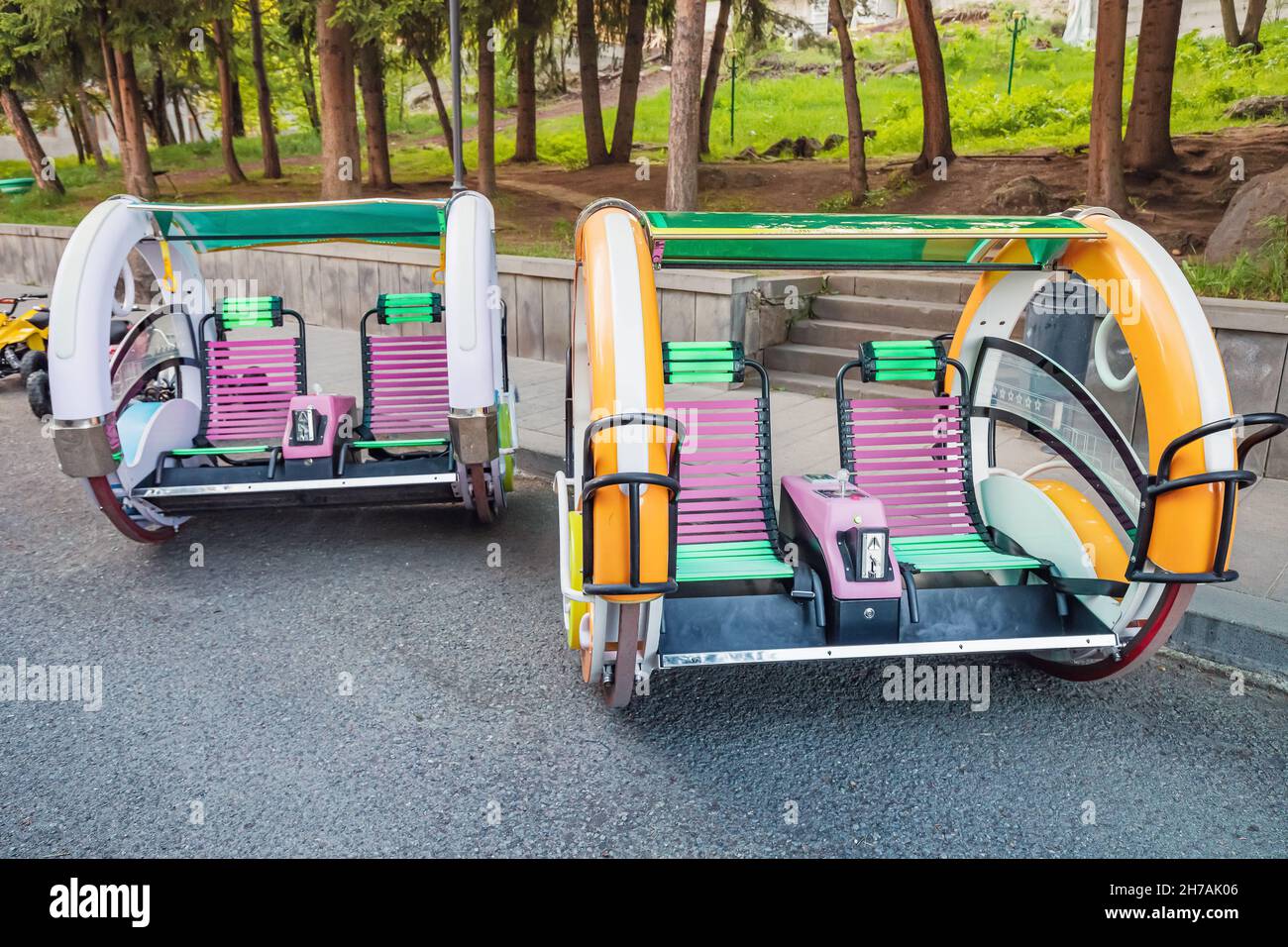 a bench on wheels based on a hoverboard or a gyro scooter for fun trips around the park with your family Stock Photo