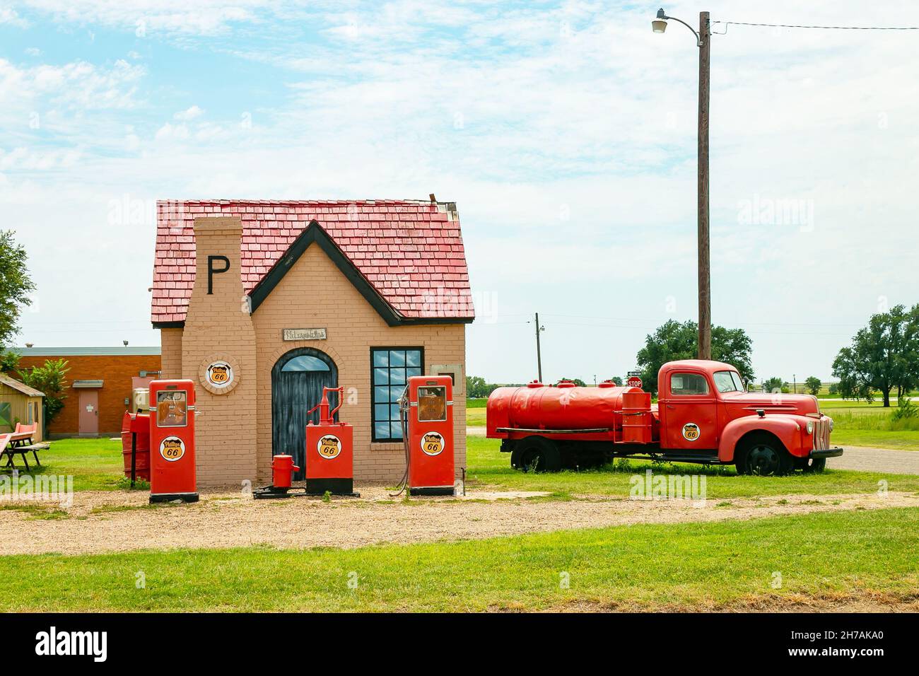 Phillips 66 gas station from 1929 and red 1940s tanker truck on the famous Route 66 in Mclean 