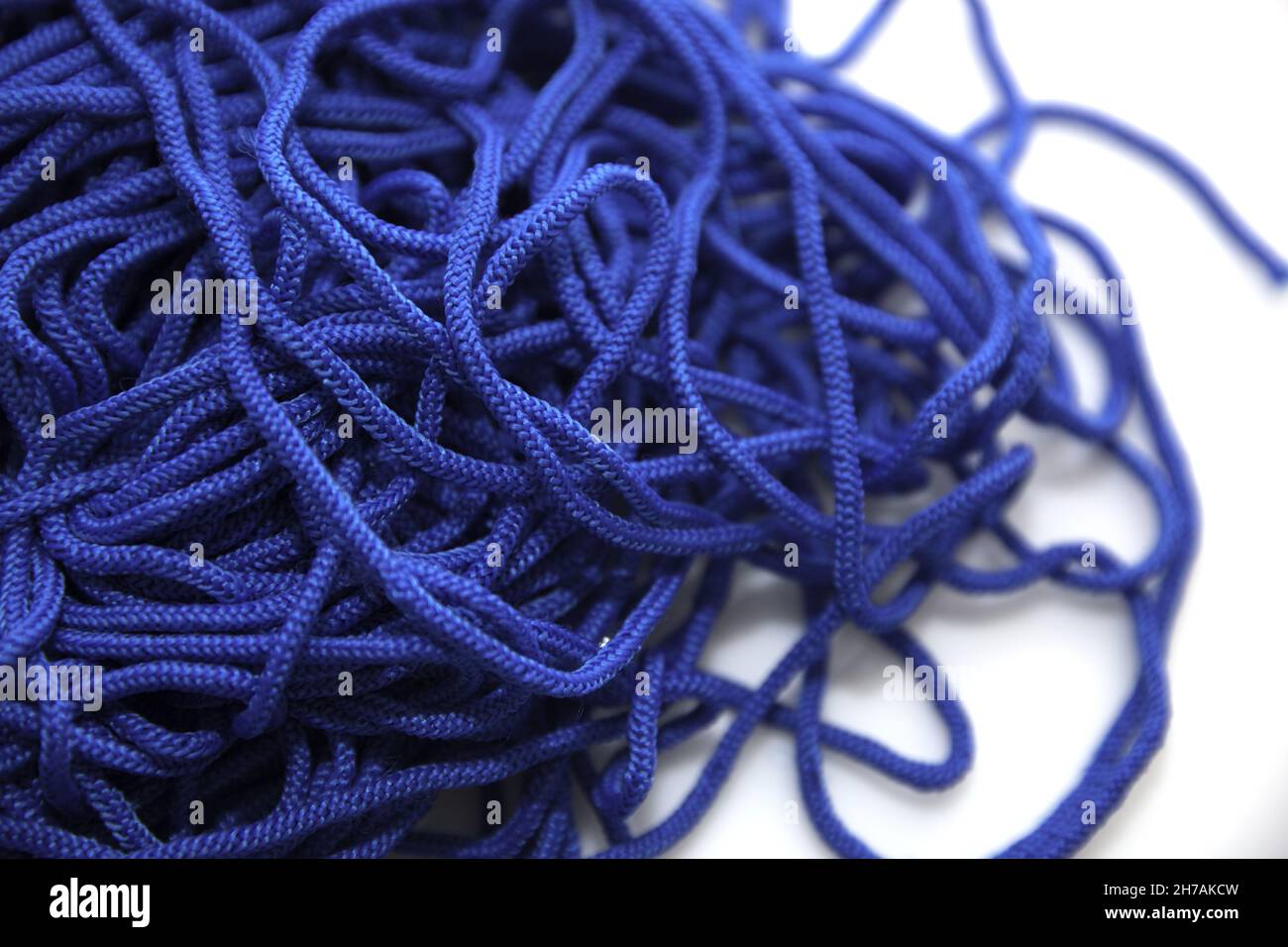 Closeup shot blue threads hi-res stock photography and images - Alamy