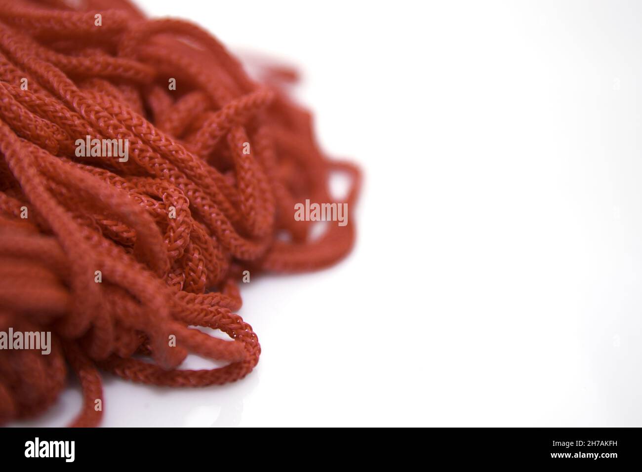 Closeup shot red threads hi-res stock photography and images - Alamy