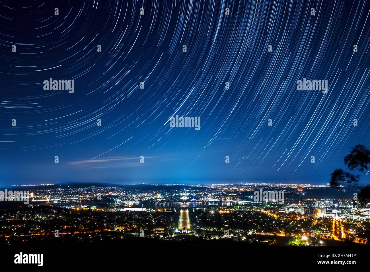 Star trail over Canberra city, ACT Australia Stock Photo