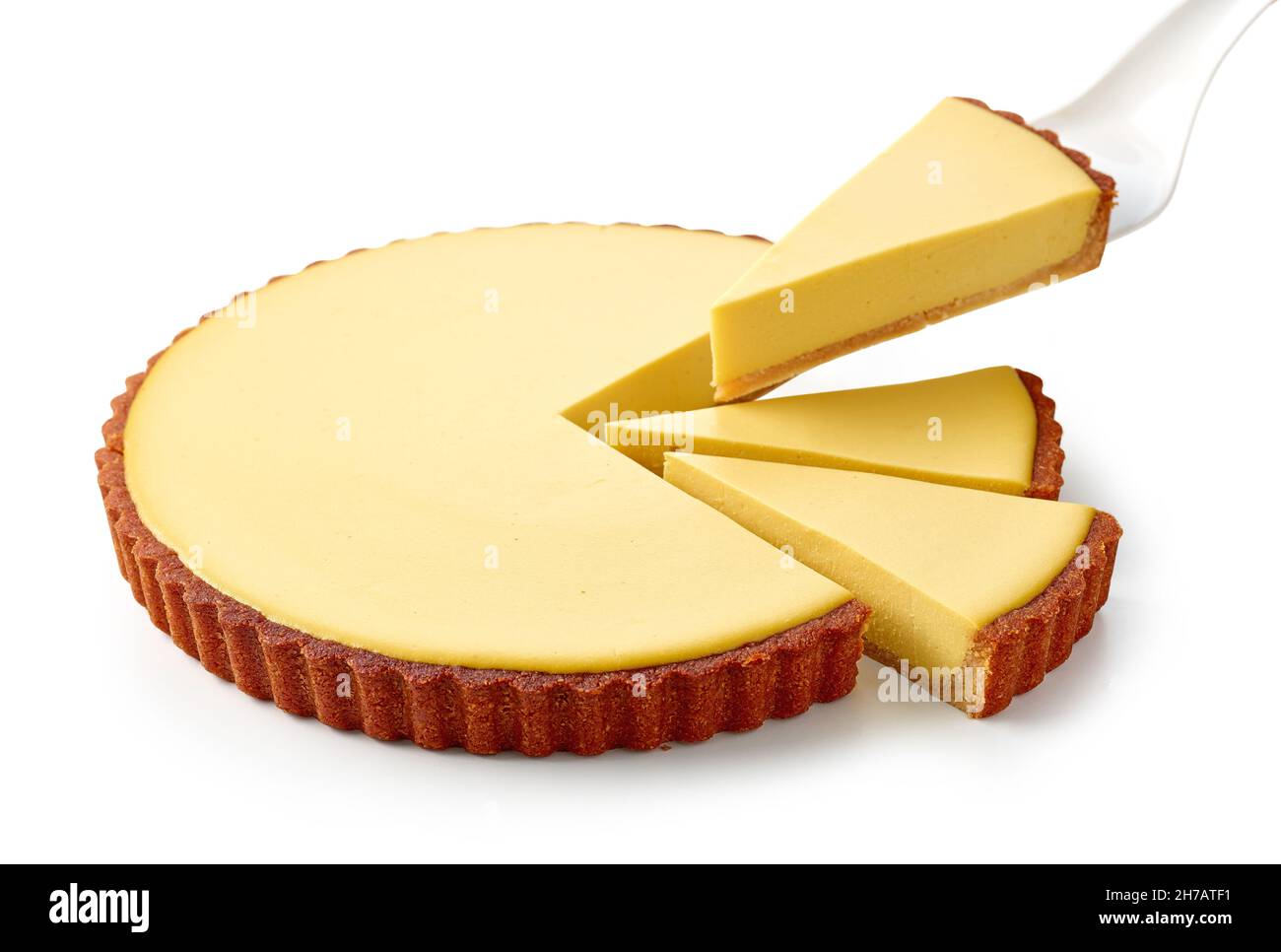 fresh sliced mango vegan cake isolated on white background Stock Photo