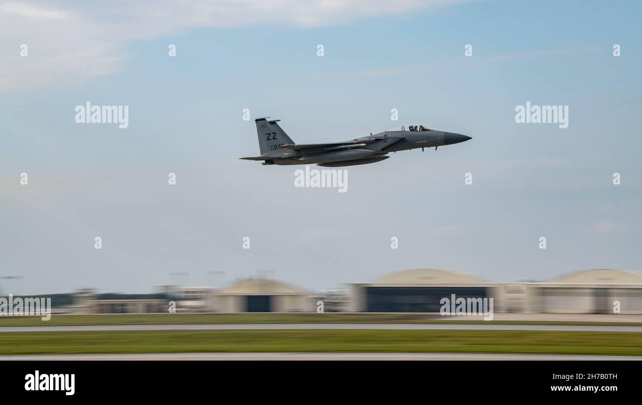 An F-15C Eagle assigned to the 44th Fighter Squadron takes off from Kadena Air Base, Japan, Nov. 17, 2021. Flying operations are key to the success of maintaining a free and open U.S. Indo-Pacific Command and provide critical training opportunities for maintenance personnel and aircrew. (U.S. Air Force photo by Senior Airman Jessi Monte) Stock Photo
