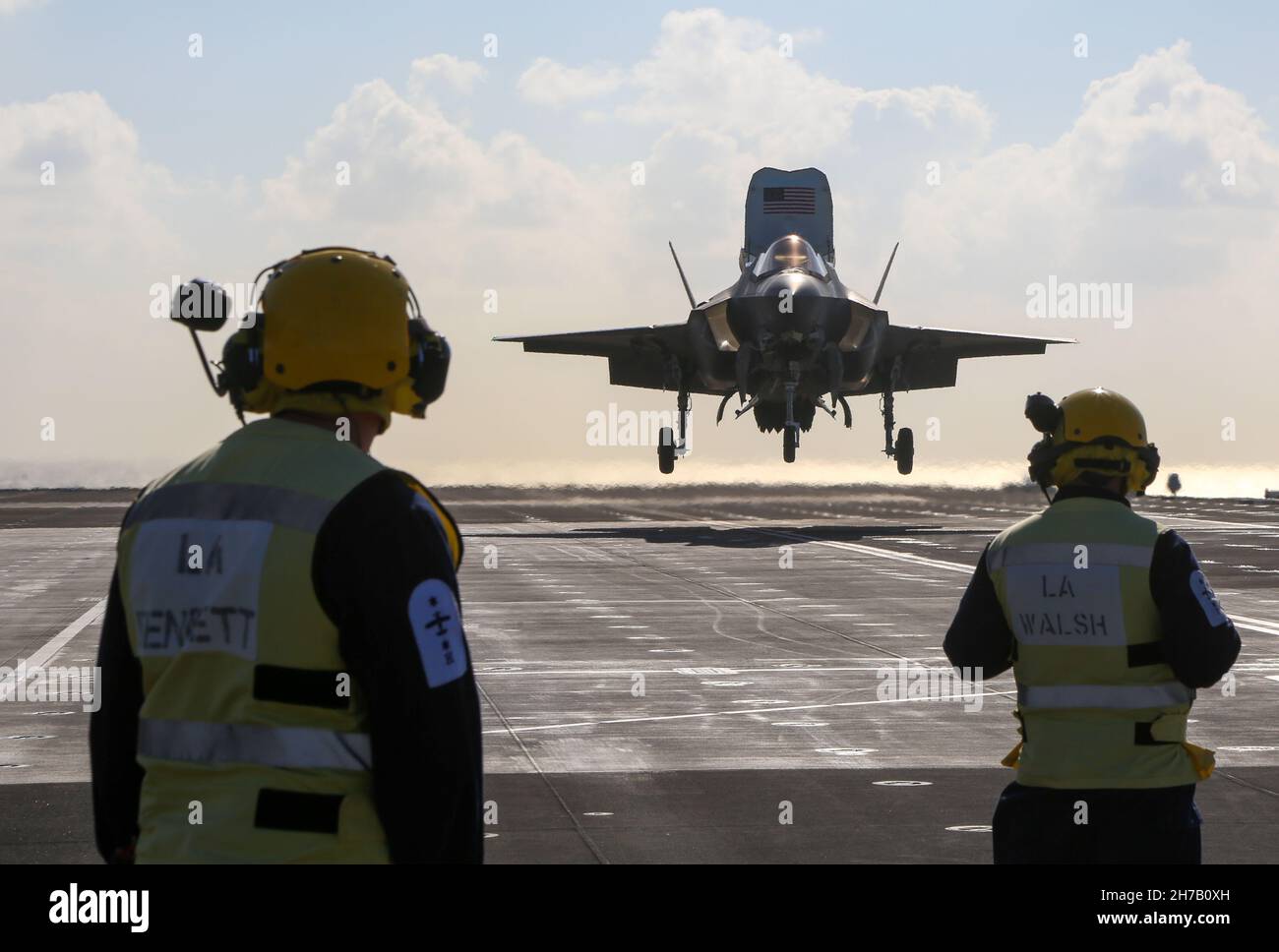 U.S. Marine Corps Brig. Gen. Simon Doran, US Senior National Representative to the United Kingdom (UK) Carrier Strike Group, lands an F-35B Lightning II on the flight deck of HMS Queen Elizabeth in the Mediterranean Sea on November 20th, 2021. This deployment demonstrates that the United States and the UK are united in our efforts to ensure security and freedom of the seas, that our maritime power projection capabilities are interoperable, complementary, and global. Stock Photo