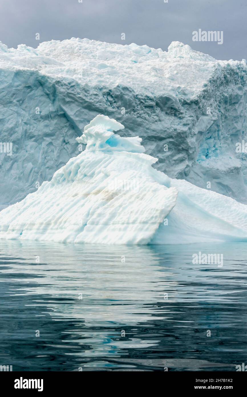 Shades of blue, iceberg with reflections, Rypefjord, Scoresby Sund, Greenland Stock Photo