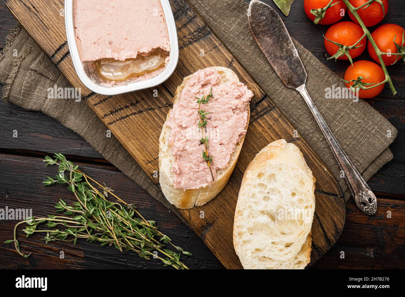 Rustic Pate Fresh chicken liver pate from can on bread set, on old dark rustic ...