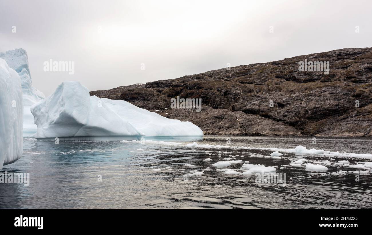 Grounded icebergs and bergy bits, Denmark Island, Scoresby Sund ...