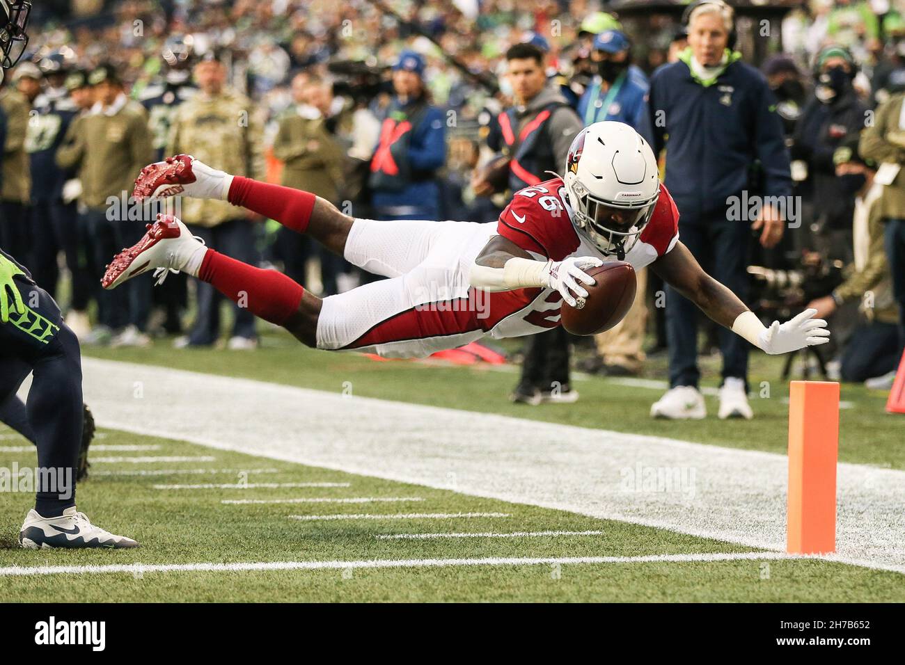 Seattle, USA. November 21, 2021: Arizona Cardinals running back Eno  Benjamin (26) tries to score a diving touchdown. The play was called back  due to a Seattle timeout before the snap during