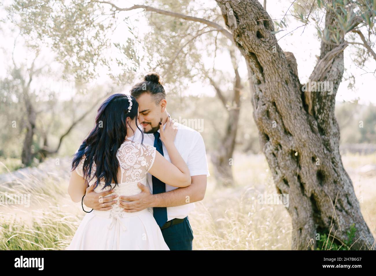 Legs bride groom hugging hi-res stock photography and images - Alamy