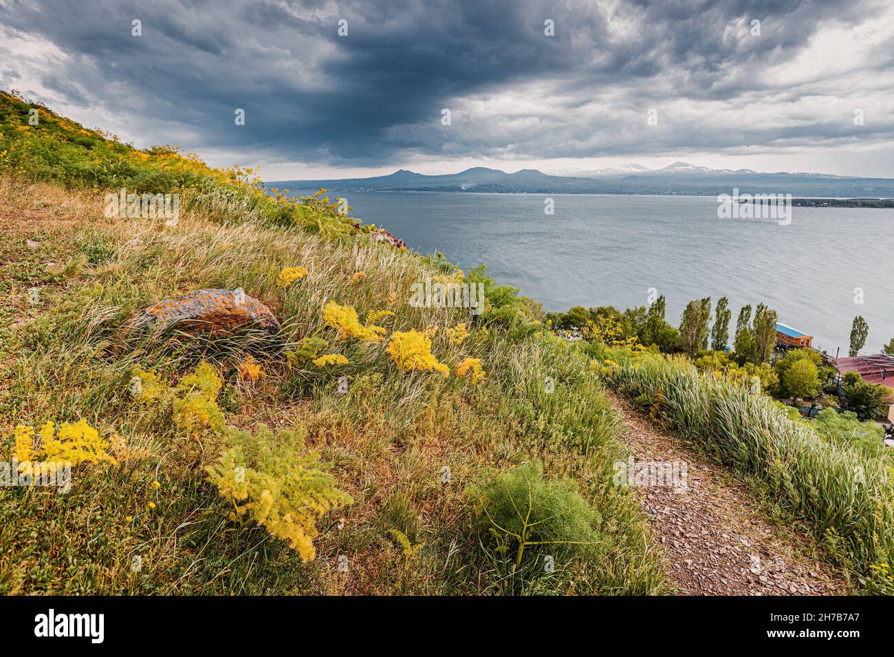 Dramatic landscape in stormy weather with strong wind on Lake Sevan. Natural travel destinations in Armenia Stock Photo