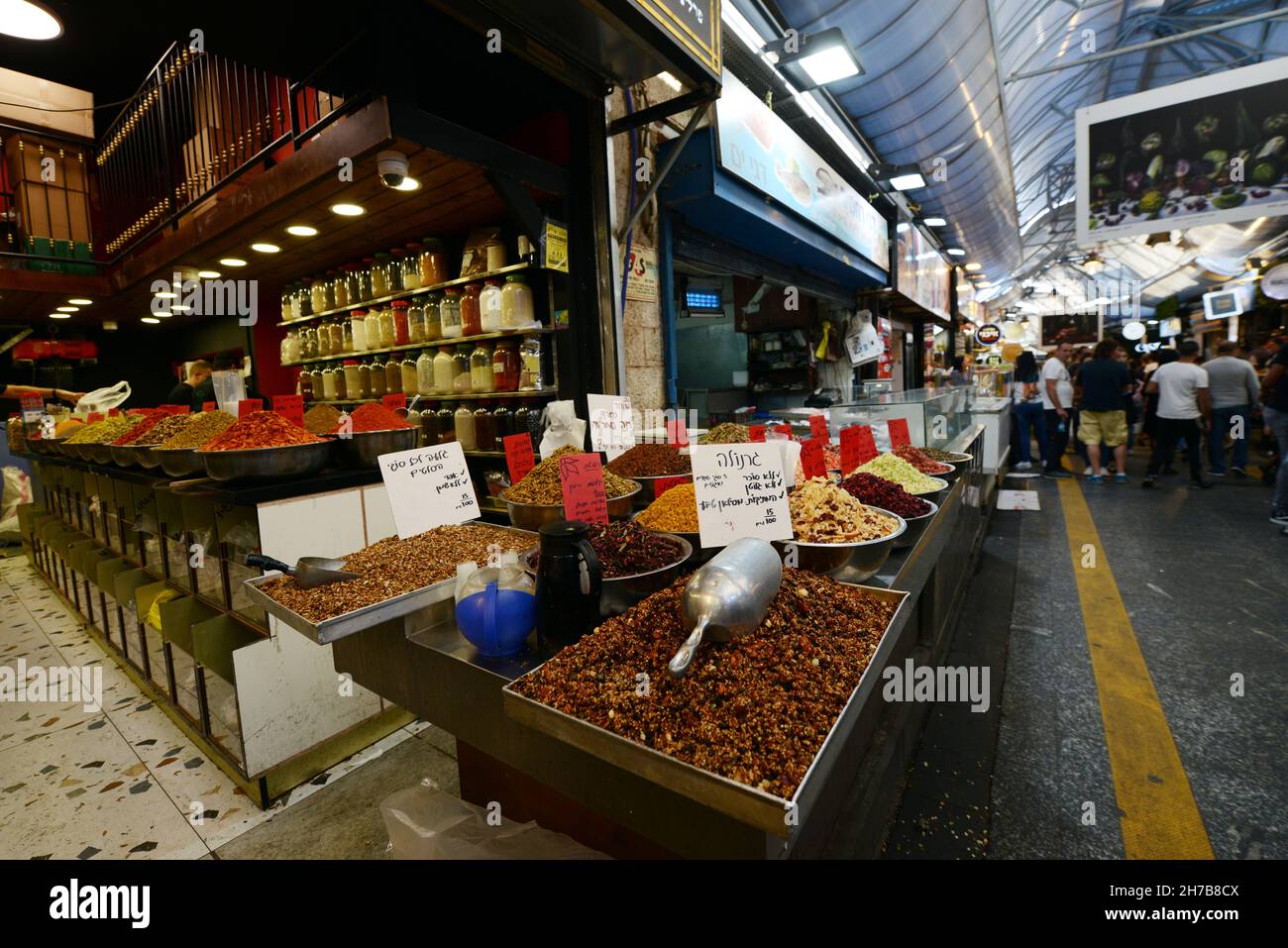 A colorful spice and herb shop at the vibrant Etz Hayyim St in the