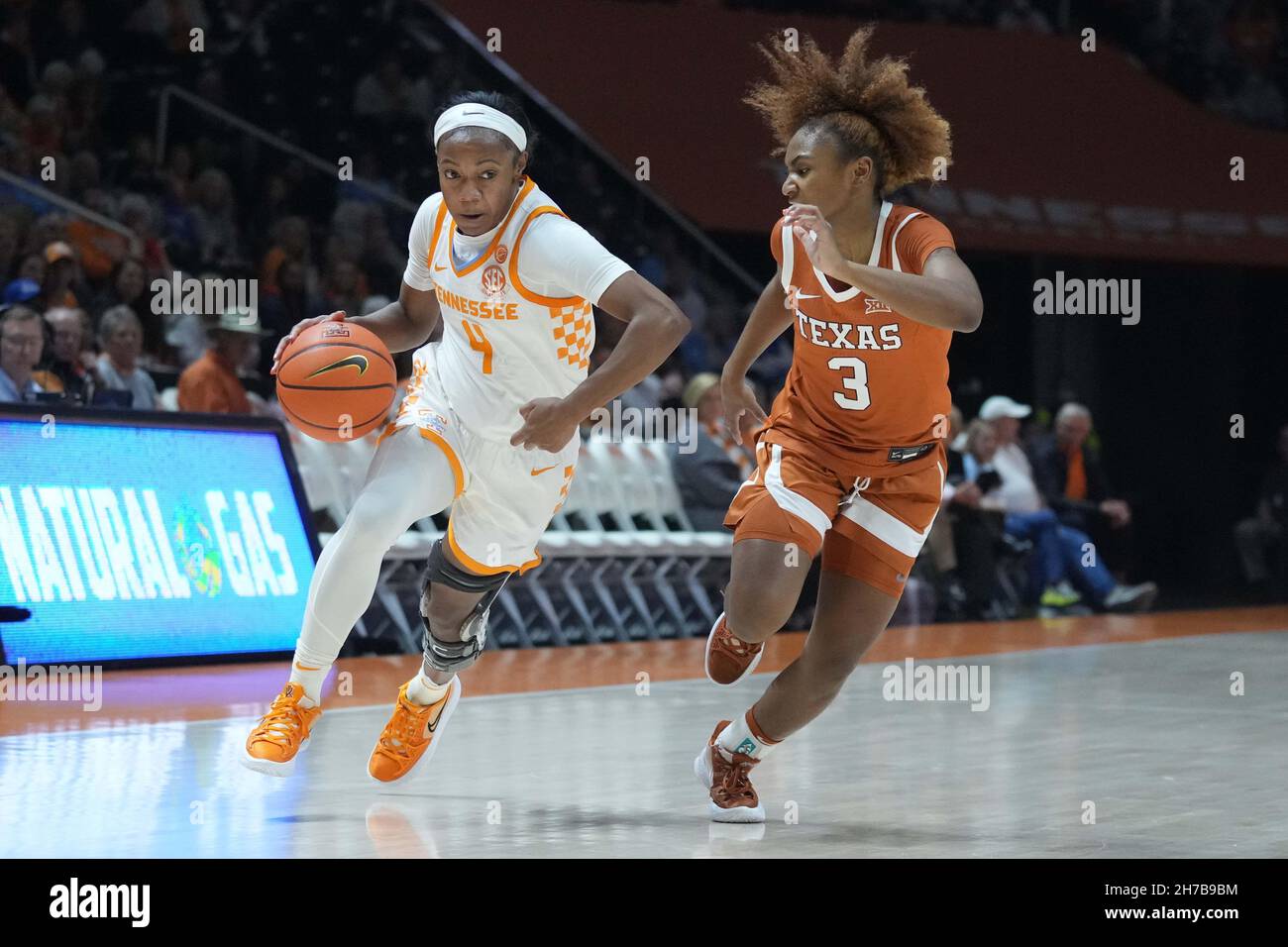 November 21, 2021: Jordan Walker #4 of the Tennessee Lady Vols drives to  the basket against Rori Harmon #3 of the Texas Longhorns during the NCAA  basketball game between the University of