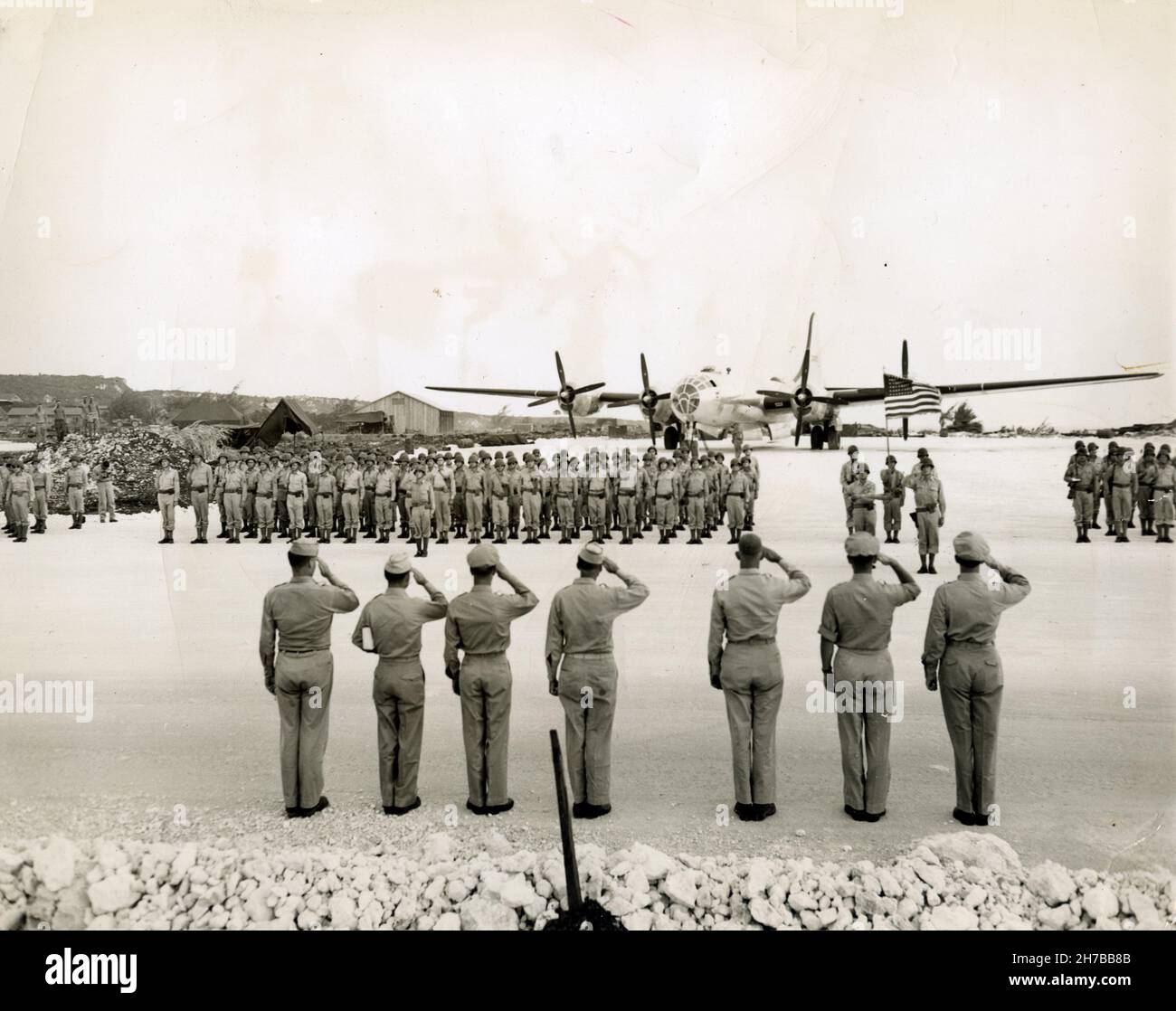 Medals for Hero B-29 crew. Saipan, on Saipan Superfortress base for the historic raid of Tokyo, medals were presented to the crew of the third photo reconnaissance squadron, which made the first photo recon mission over Tokyo. The B-29, which made the flight, is in the background during the medal awards ceremony. November 27, 1944 Stock Photo
