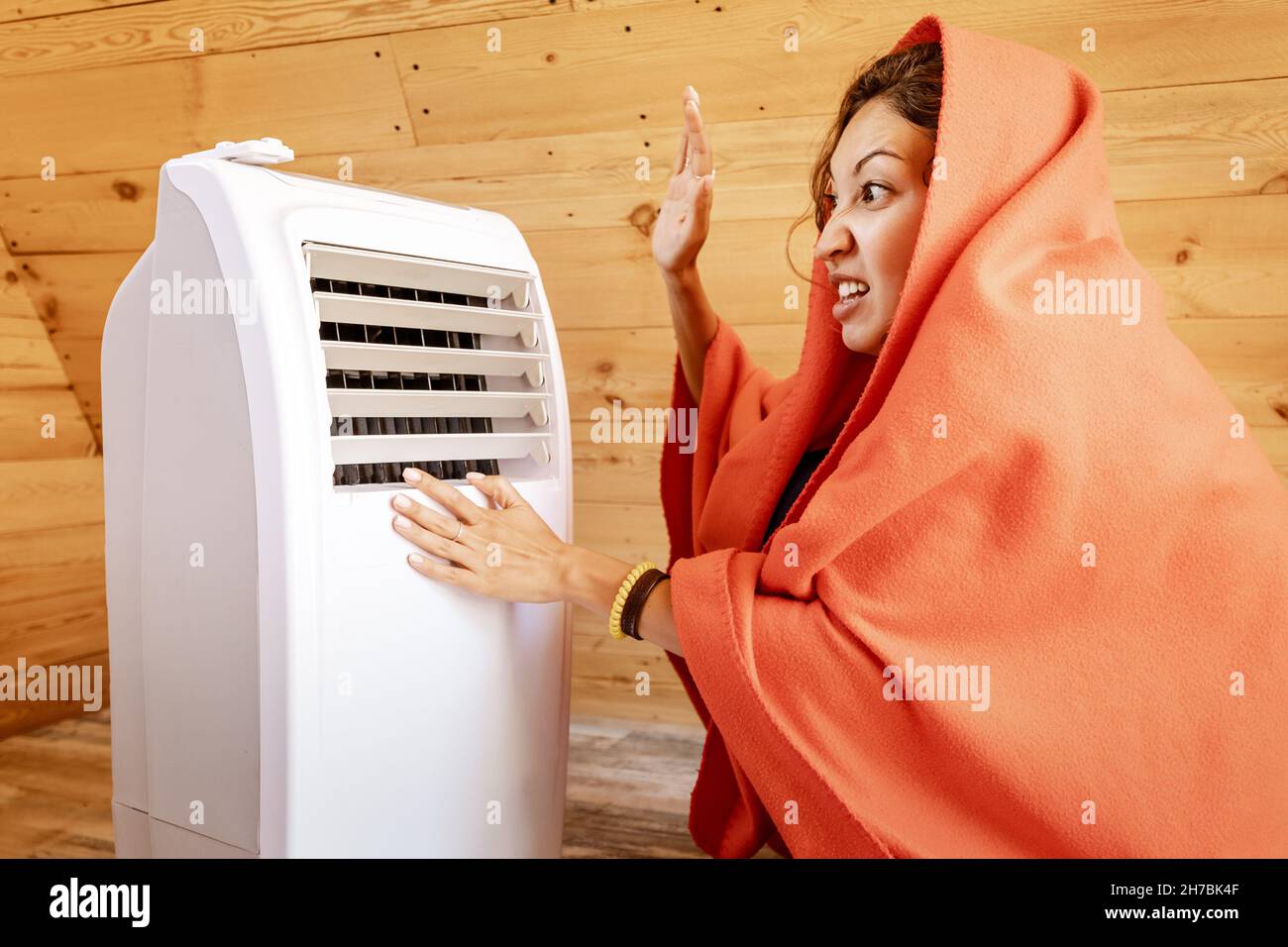 The electric heater broke down in winter and does not turn on. An angry ...